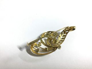 broche oro 18k con piedra