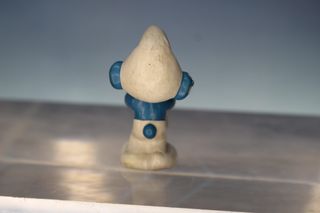 Figura PVC. Puffo musicista con clarinetto. I Puffi.