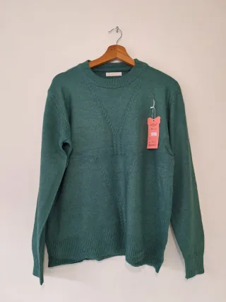 Jersey verde con trenzas