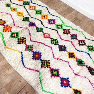 Alfombra de lana beige y multicolor