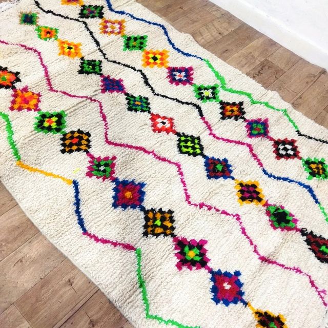 Alfombra de lana beige y multicolor