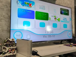 Nintendo Wii + Wii Fit Plus + giochi + accessori