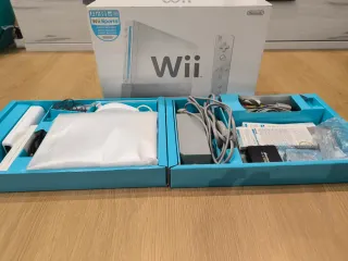 Nintendo Wii + Wii Fit Plus + giochi + accessori