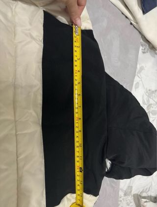 Piumino Champion beige e nero