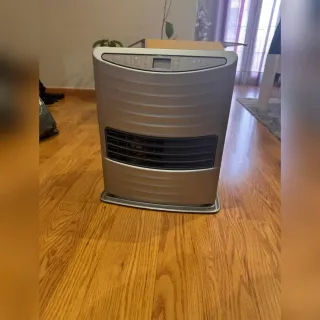 Estufa de parafina plateada