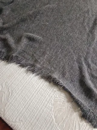 Manta decorativa gris