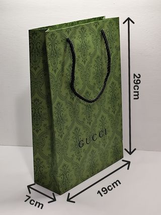 Busta di carta Gucci verde con manici in stoffa