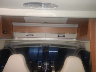 Autocaravana perfilada cama isla