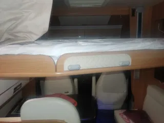 Autocaravana perfilada cama isla