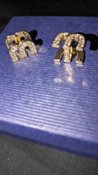 Orecchini Miu Miu in acciaio placcato oro e Zircon