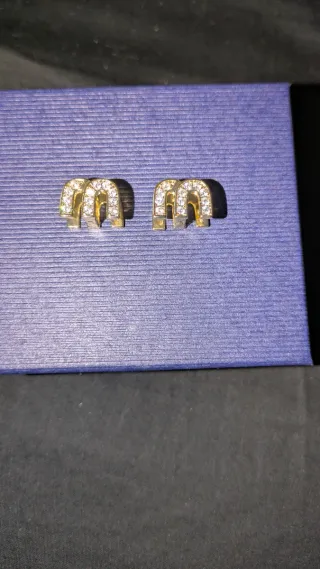 Orecchini Miu Miu in acciaio placcato oro e Zircon