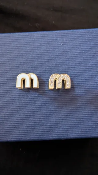 Orecchini Miu Miu in acciaio placcato oro e Zircon