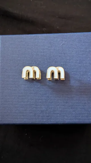 Orecchini Miu Miu in acciaio placcato oro e Zircon