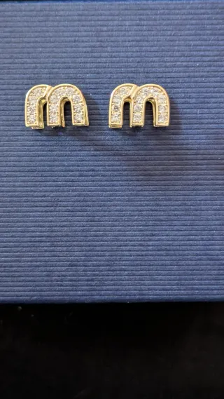 Orecchini Miu Miu in acciaio placcato oro e Zircon