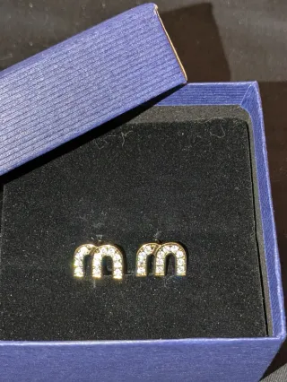 Orecchini Miu Miu in acciaio placcato oro e Zircon