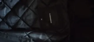 Cazadora negra hombre