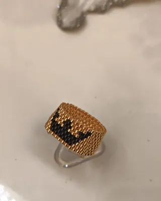 Anillo Miyuki Negro y Dorado