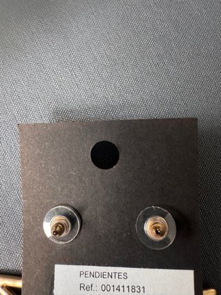 Pendientes estrella con plumas rosa y oro