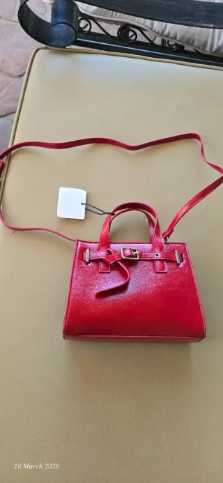 Bolsos negros y rosa Tengo mucho bolsa dese 5€