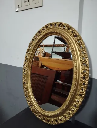 Espejo antiguo ovalado dorado