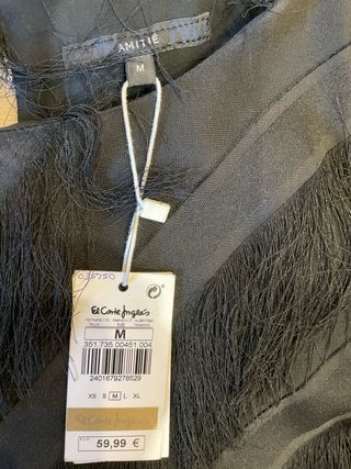 Vestido de fiesta negro con flecos
