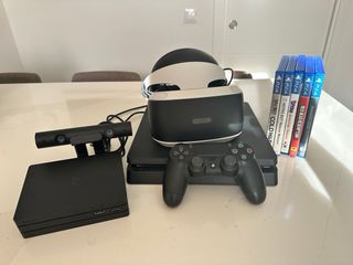 PS4 1Tb, 5 juegos, y gafas rv, 1 mando.