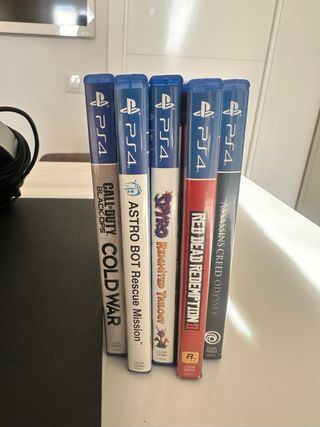 PS4 1Tb, 5 juegos, y gafas rv, 1 mando.