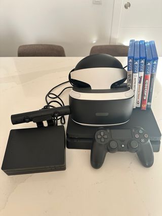 PS4 1Tb, 5 juegos, y gafas rv, 1 mando.