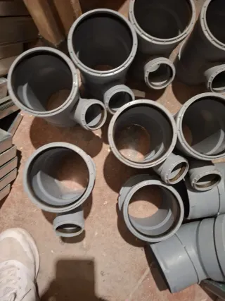 Piezas fontanería PVC