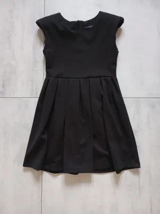 Vestito nero corto con pieghe