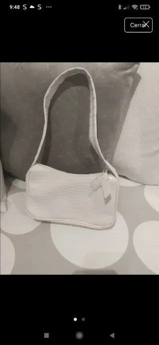 Borsa bianca e cinture regalo