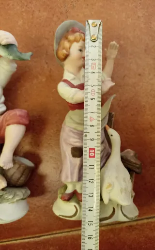 Pareja figuras vintage porcelana niño y niña