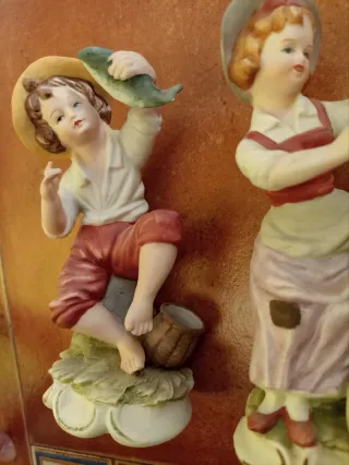 Pareja figuras vintage porcelana niño y niña