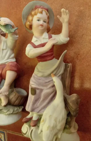 Pareja figuras vintage porcelana niño y niña