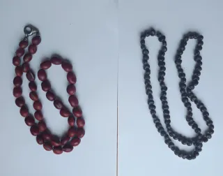 Collane di semi marroni e rossi