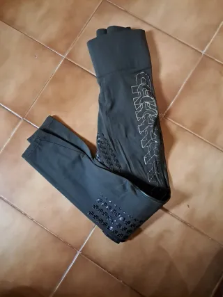 Pantalones de equitación negros con detalles