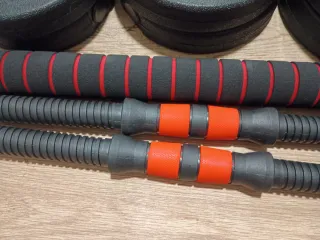 Set di pesi per palestra con manubri