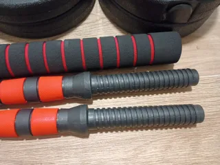 Set di pesi per palestra con manubri