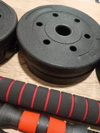 Set di pesi per palestra con manubri