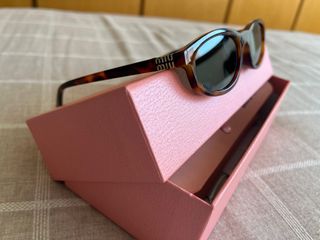 Occhiali da sole Miu Miu Tartaruga