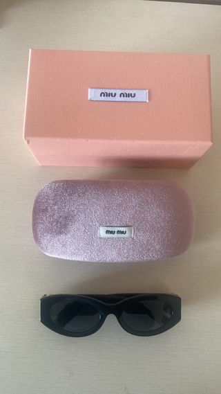 Occhiali da sole Miu Miu neri e oro