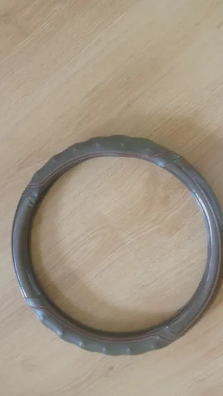 NUEVO Funda para volante de coche 15 x 15 cm.