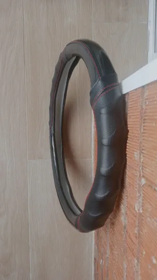 NUEVO Funda para volante de coche 15 x 15 cm.