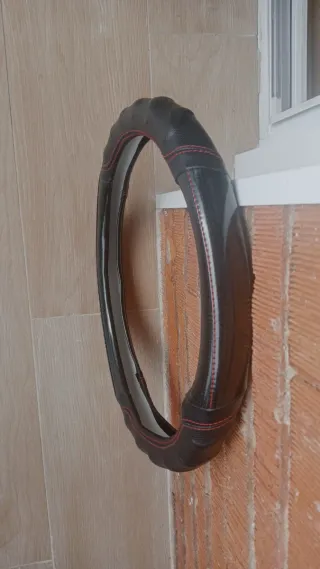 NUEVO Funda para volante de coche 15 x 15 cm.