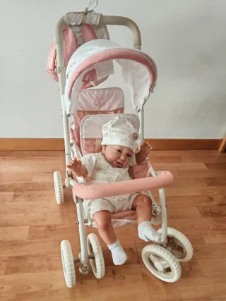 Cochecito de muñeca doble rosa + muñeco de vinilo