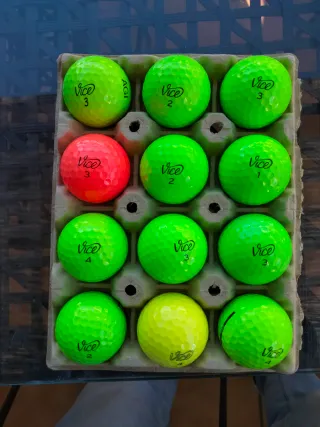 Lote 12 bolas golf Vice de color.