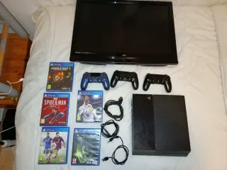 PS4 (PlayStation 4) Nera + 4 Giochi