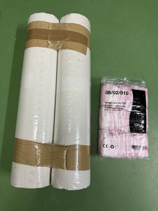 Camilla, rollos papel desechable y 100 tangas dese