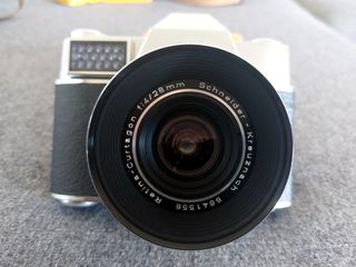 Kodak Retina Reflex IV con varios objetivos