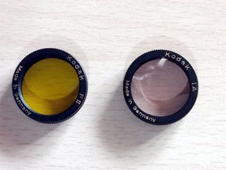 Kodak Retina Reflex IV con varios objetivos